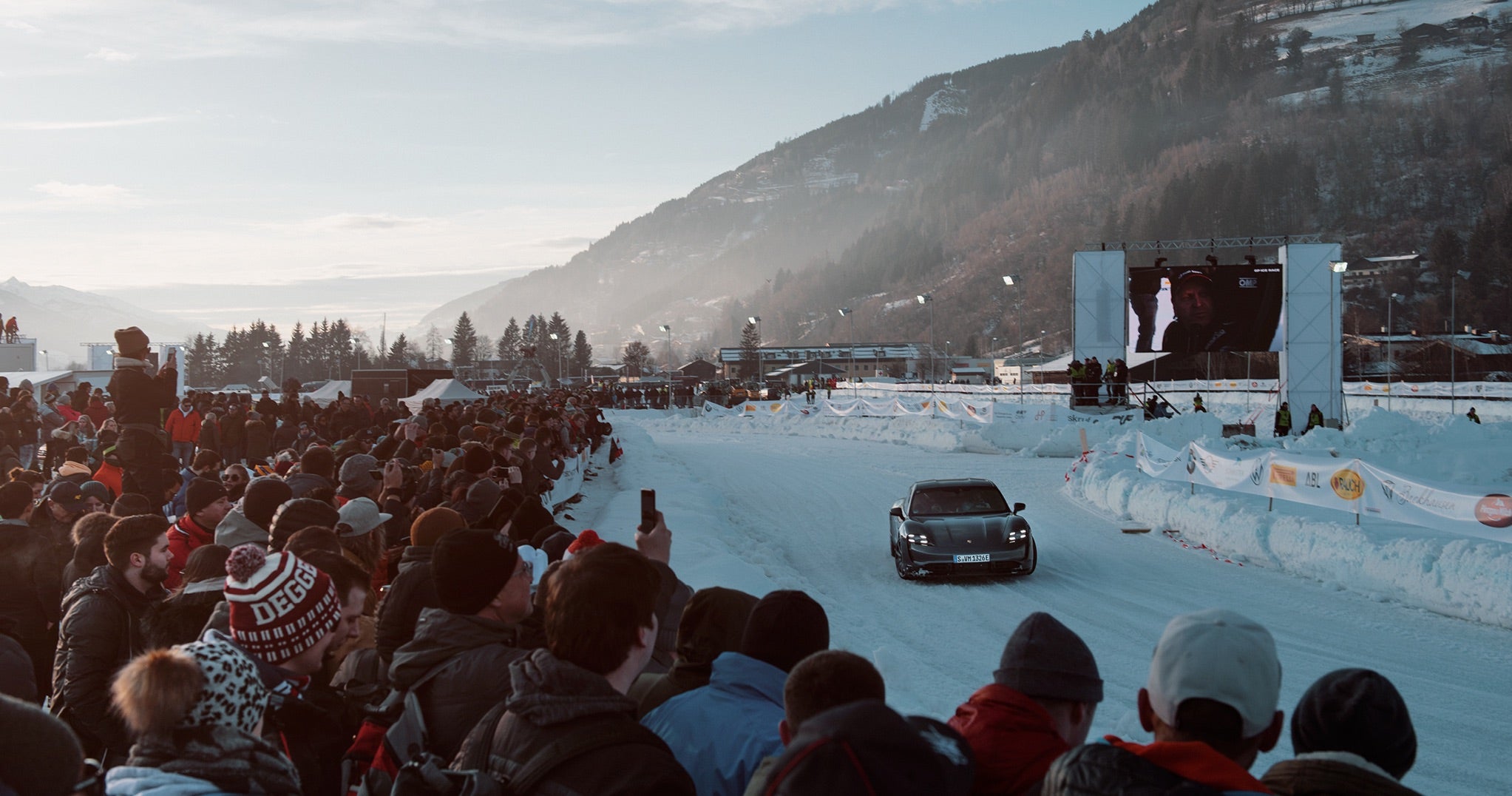 <span>Spectators at the 2020 Ice Race watch as Porsche’s new Taycan Turbo S takes its turn on the track</span> <br/><span class="caption-sub"><em>Photo credit: F.A.T. International</em></span><br/>